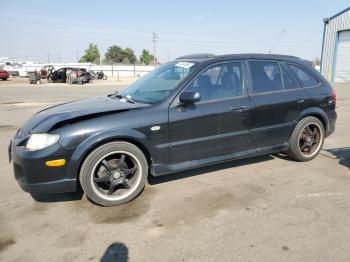  Salvage Mazda Protege